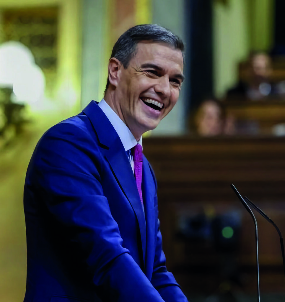 Pedro Sanchez riendo